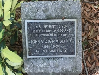 Here's an alt tag for the image: Memorial plaque for John Miseroy.